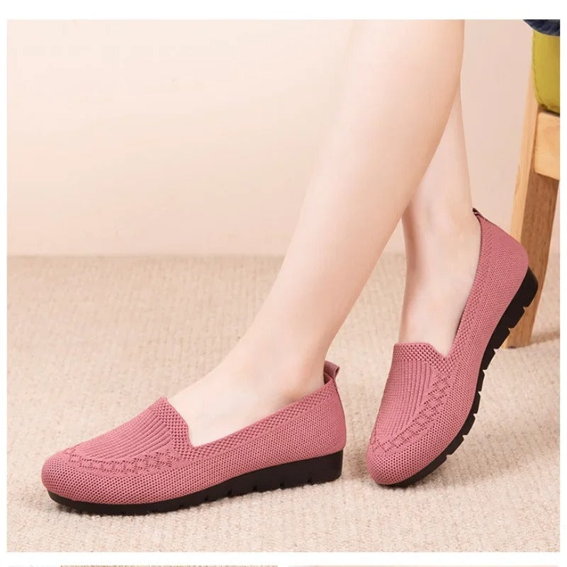 Rosa pustende flats for kvinner, slip-on loafers som gir komfort hele dagen.