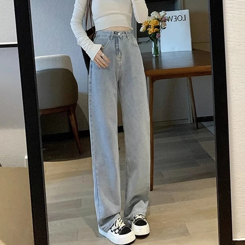 Vintage-inspirerte kvinner jeans med vide ben, ideelle for både komfort og stil.
