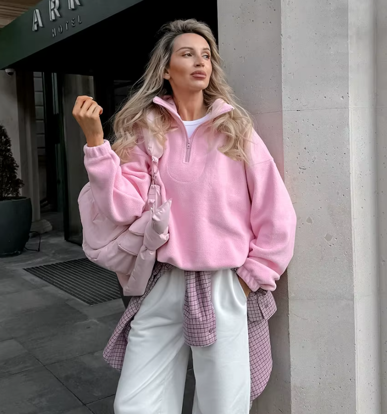 Stilfull casual genser for kvinner i rosa med praktisk glidelås.