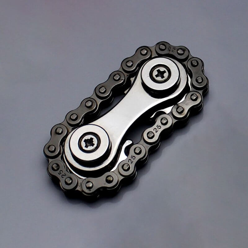 Bærbart fidget fingertuppkjede i rustfritt stål. Ideelt for angstlindring og konsentrasjon.