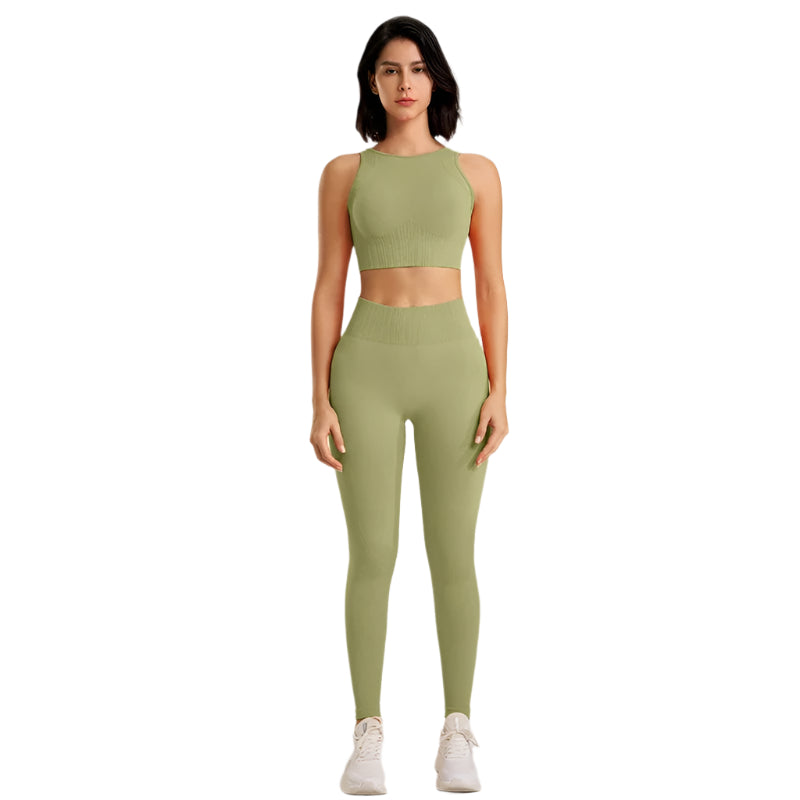 Kvinner todelt sømløst yogasett. Høy midje leggings og sportstopp for fitness og velvære.