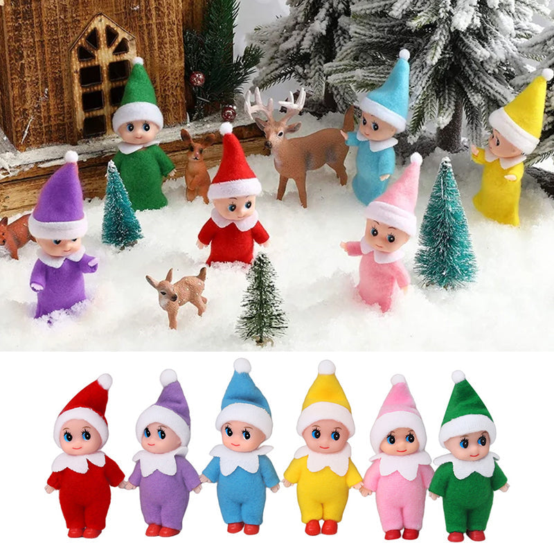 Festlig julebaby-alvedukke med koselig drakt, ideell for julepynt.