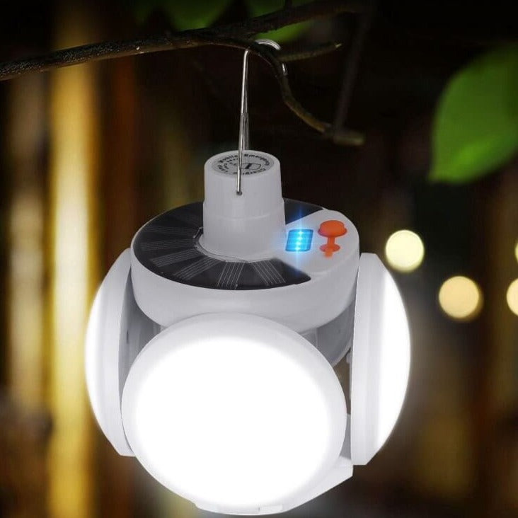 Bærbar solcelle LED-lampe med sammenleggbart design. Perfekt campinglys og utendørsbelysning.