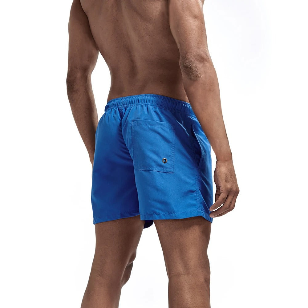 Herre badeshorts, hurtigtørkende, med innvendig mesh-bukse for ekstra komfort.