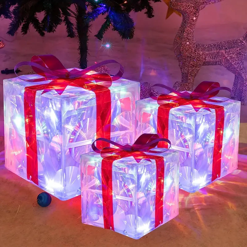 Skinnende julegaveesker med innebygde LED-lys, perfekt for innendørs julepynt eller utendørs festdekor.