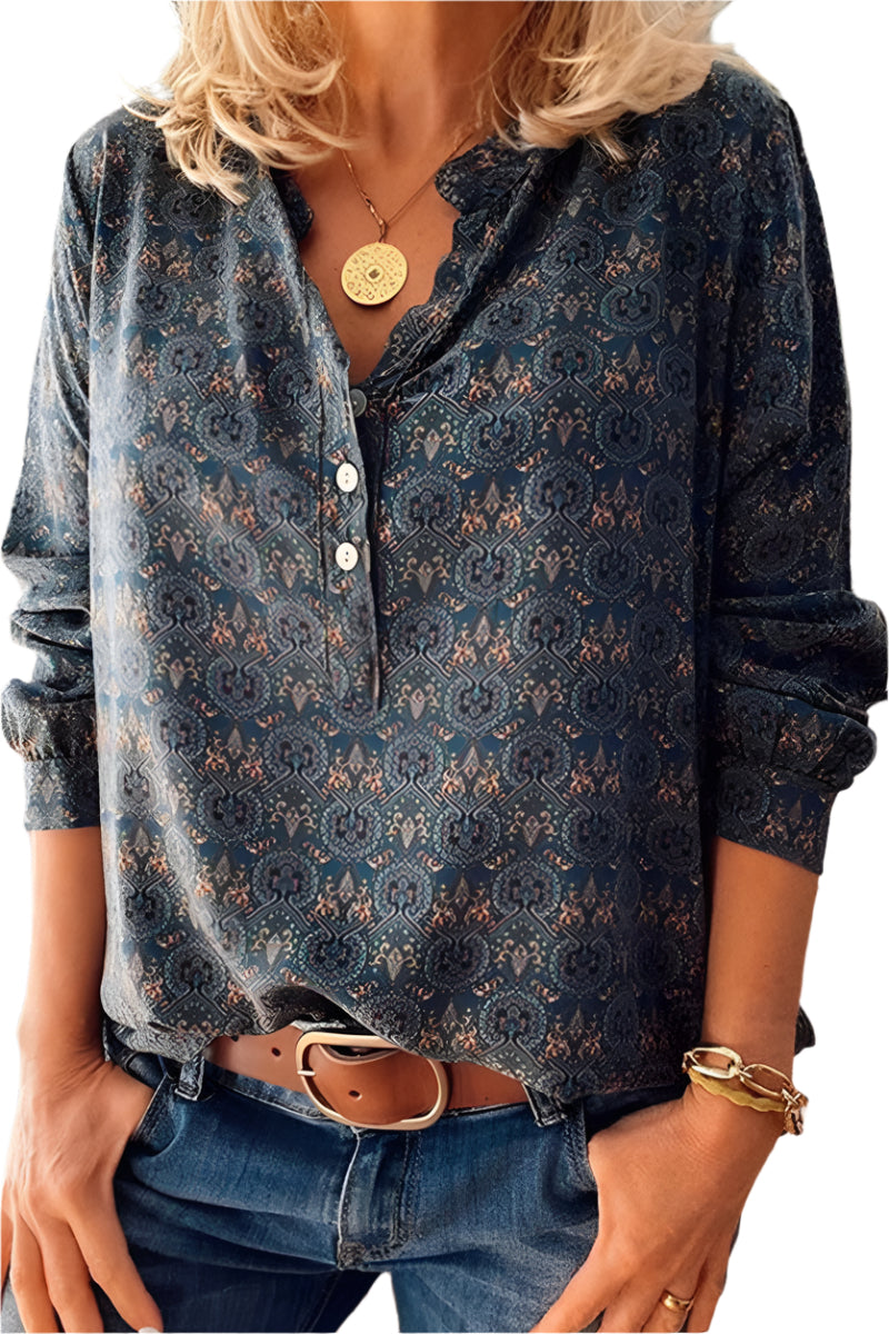 Stilfull damebluse med heldekkende trykk, elegant utskjæring og løs passform for vår/sommer.