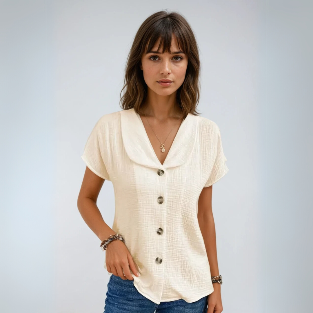 Komfortabel og elegant damebluse, ideell for vår og sommer. Avslappet passform.