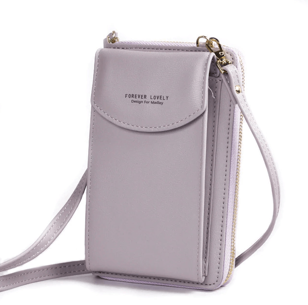 Organisert interiør av en stilfull PU-lær crossbody veske for damer.