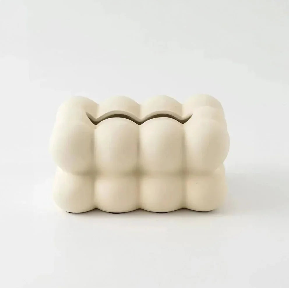 Glatt, fargerik vevsboks i bobleform. Moderne design som passer til stilfull hjemmedekor og praktisk oppbevaring.
