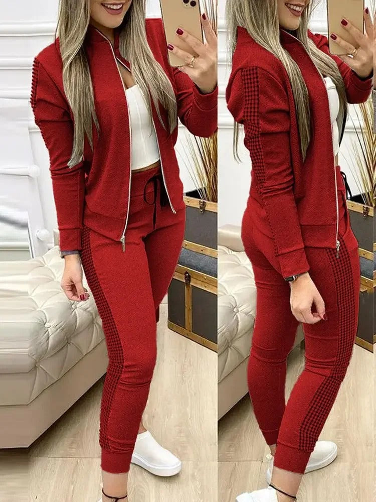 Zip-up topp og bukse vinter treningsdress for kvinner. Komfortabelt to-delt sett, ideelt for activewear.