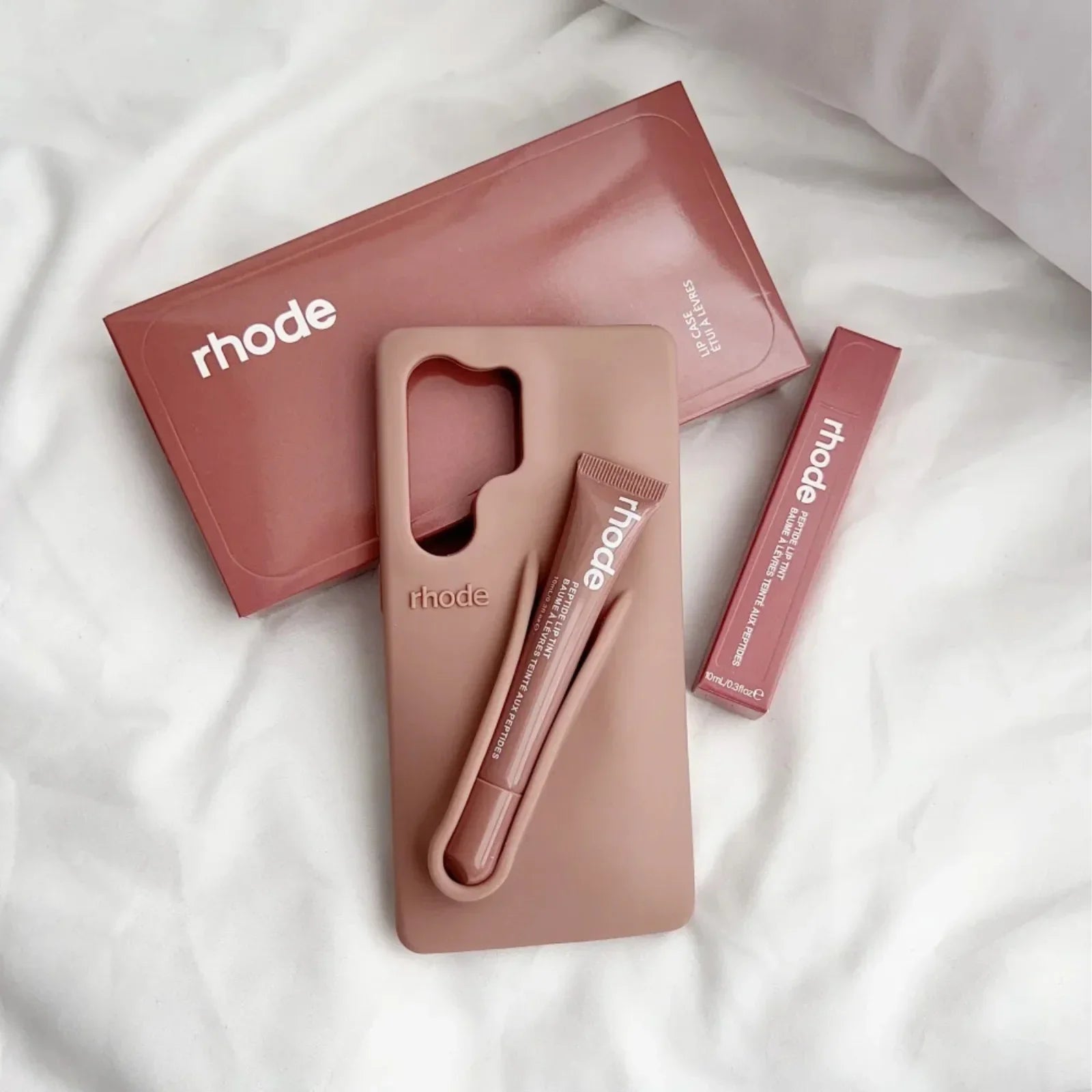 Mote Galaxy mobildeksel med stilrent design, robust beskyttelse og innebygd lipgloss-sett.
