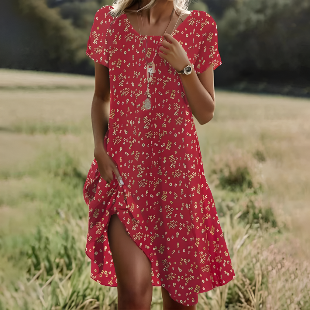 Elegant og lett midikjole for kvinner, ideell for varme sommerdager.