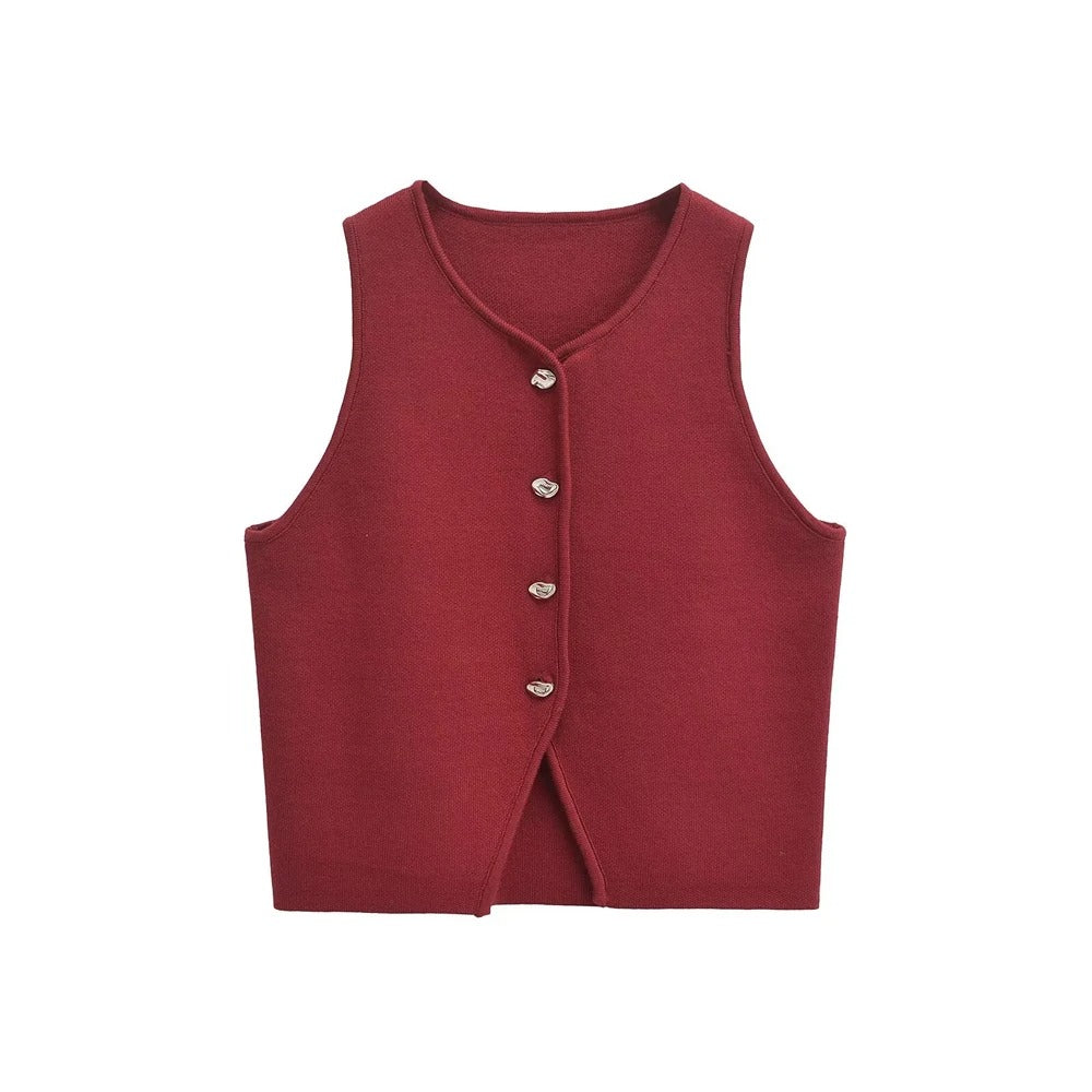 Kvinner cropped strikkevest med stilrene knapper. Perfekt vest for mote og lagpålag.