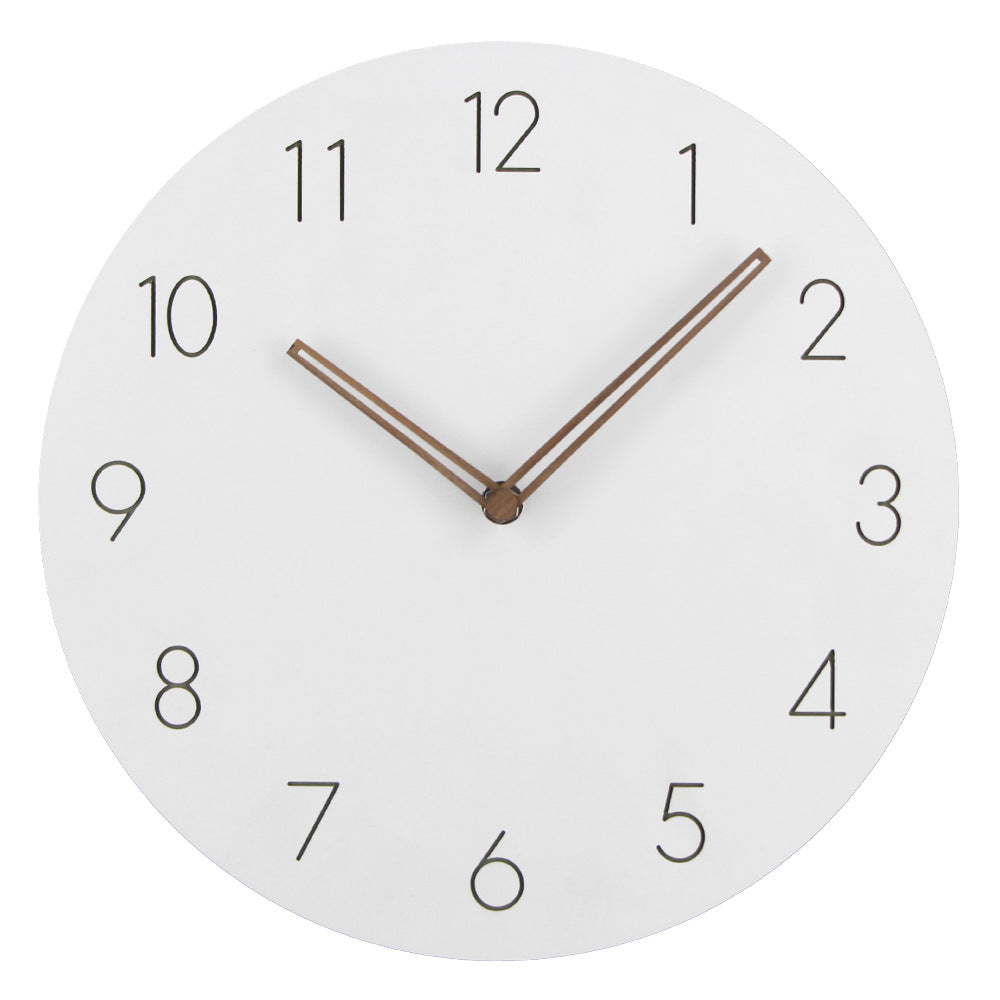 Stilren veggklokke, moderne design som passer perfekt i minimalistiske hjem. En stille klokke for ro i hverdagen.