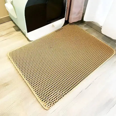 Stor og fleksibel kattesandmatte i EVA-materiale. Optimal for å bevare renheten rundt kattens toalett.