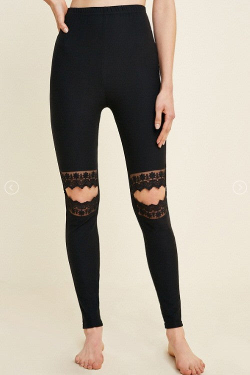 Elegant svart dameleggings med blonder, ideell for både hverdag og fest. Komfortabel passform, trendy design.
