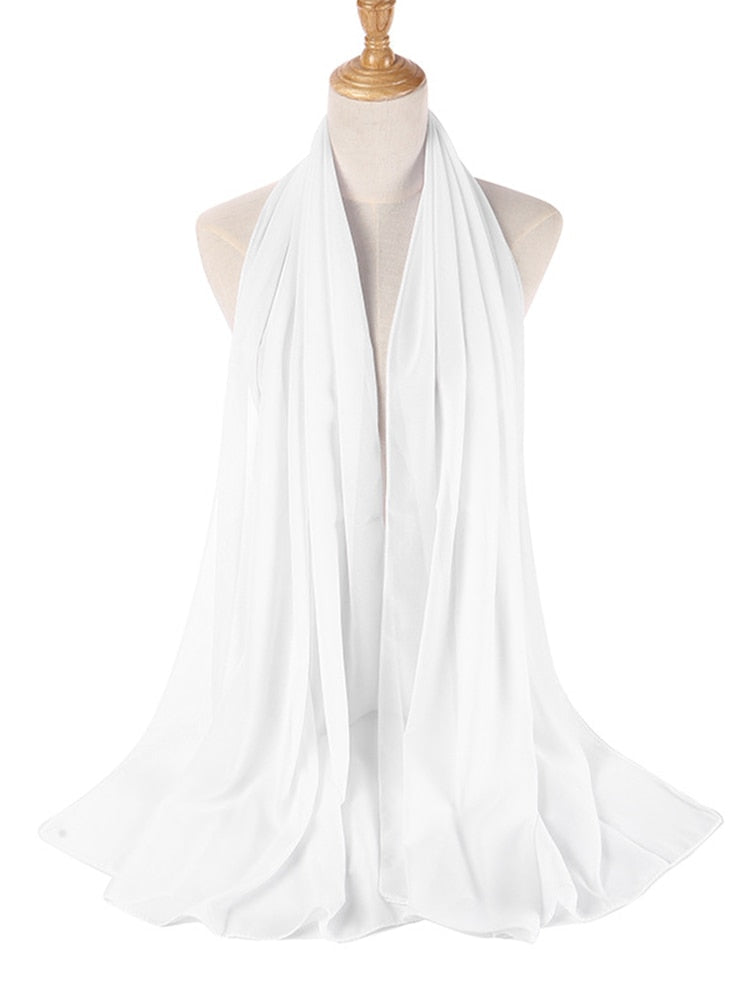 Fuksia glatt flerfarget hodebånd i slørstil. Elegant tilbehør for kvinner i varme toner.