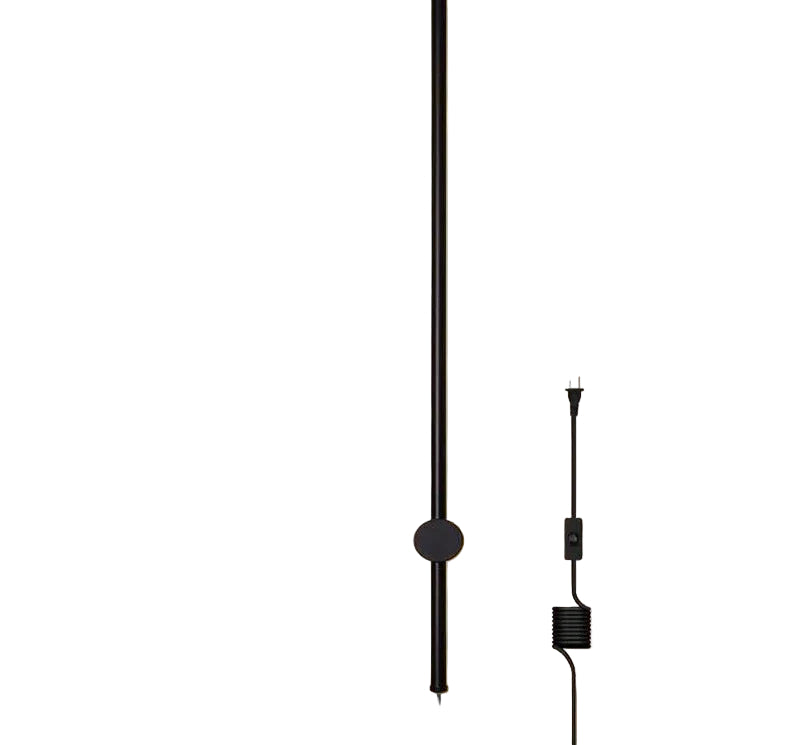 Svart minimalistisk LED vegglampe, perfekt for moderne stueinteriør.