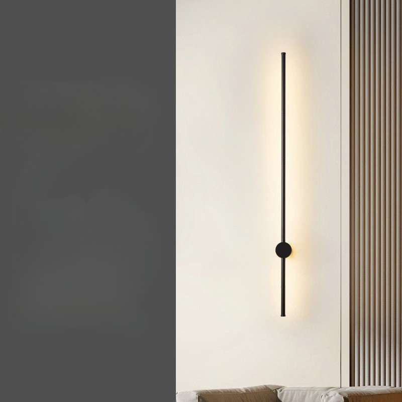 Stilren svart vegglampe med LED, et minimalistisk design som passer alle rom.
