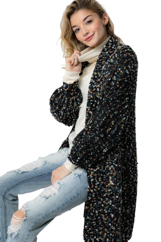 Svart oversized damecardigan for kvinner, komfortabel og trendy for hverdagsklær.
