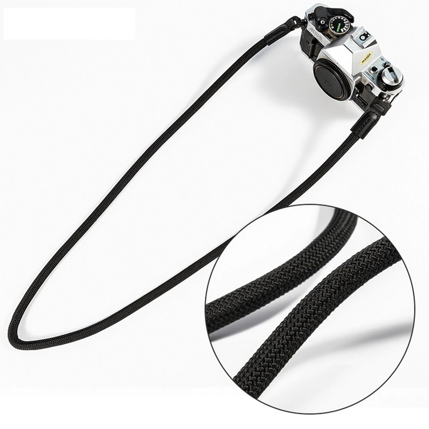 Svart universal kamerastropp i nylon. Slitesterk for sikker og komfortabel fotografering.