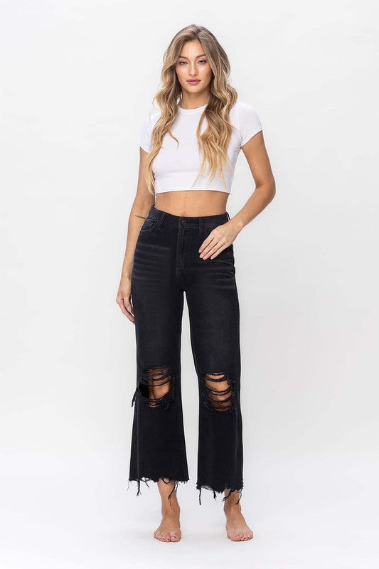 Stilige vintage 90-talls svarte damejeans med crop flare. Komfortabel høy midje for motestil.