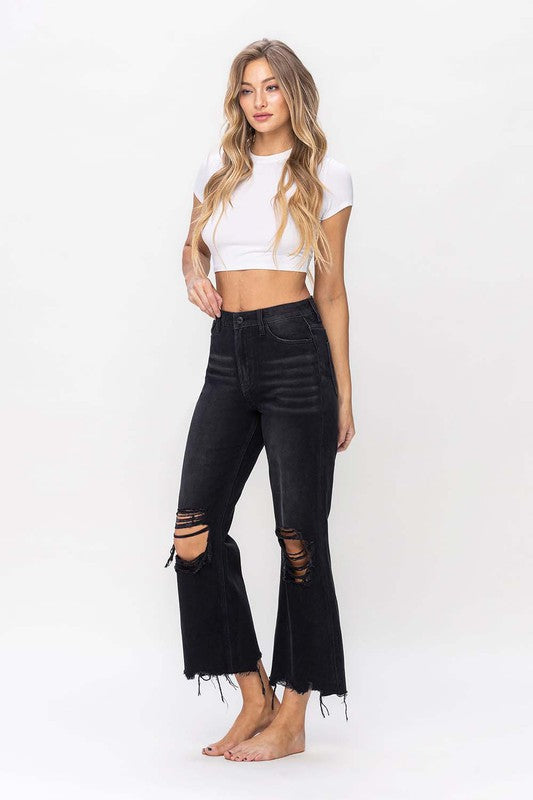 Klassiske svarte damejeans med høy midje og trendy crop flare-ben. Autentisk vintage 90-talls look.