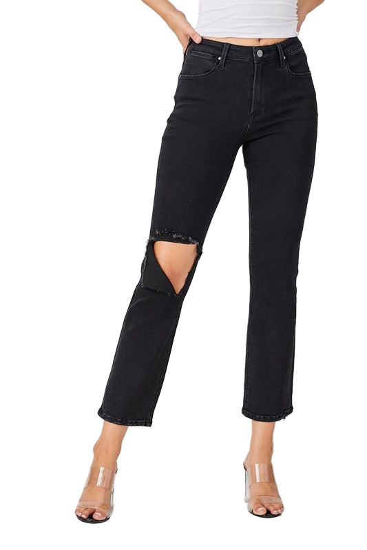 Svarte damejeans med komfortabel passform, trendy slitt design for hverdagsbruk. Moderne kvinnebukser.