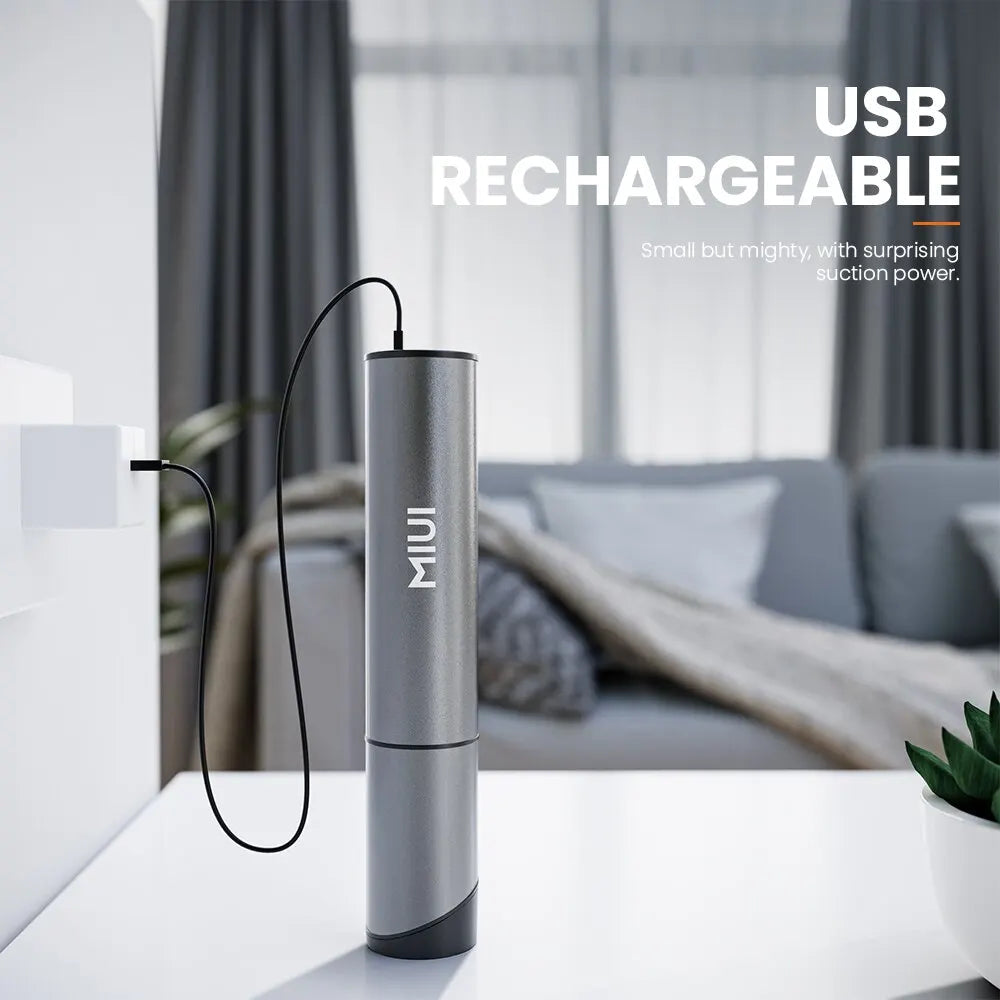 Trådløs håndstøvsuger med USB-ladekabel. Praktisk og bærbar rengjøring uten ledning.