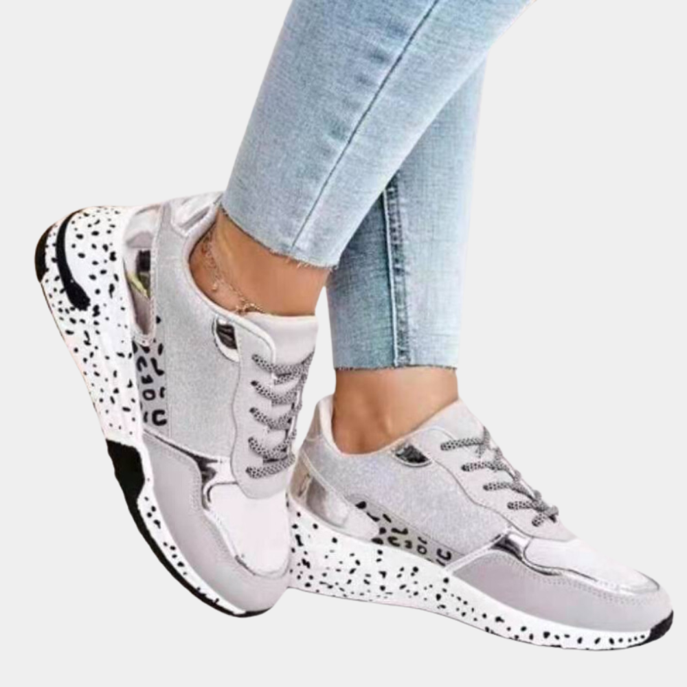 Grå og gull damesneakers. Komfortable hverdagssko, støtdempende, perfekte som fritidssko.