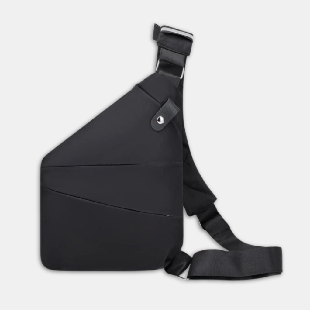 Unisex tyverisikker skulderveske båret av en person, viser komfort og praktisk design for dagligbruk.