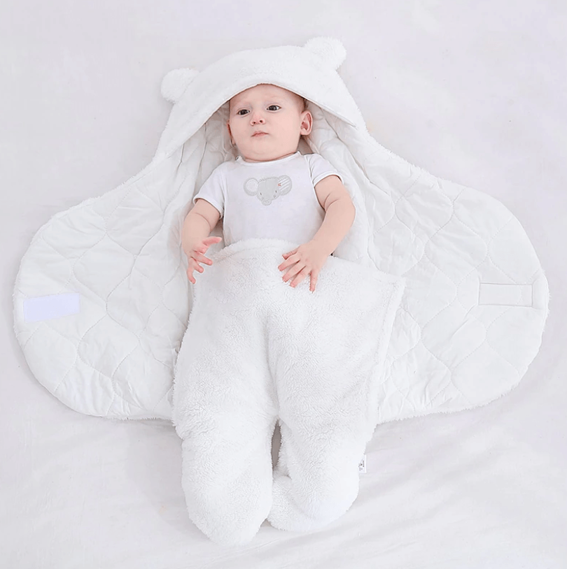 Babystrikk design: Enkel oppskrift på myk sovepose.