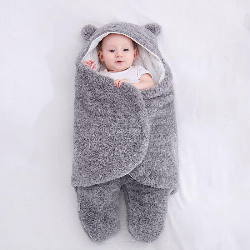 Baby utstyr: Praktisk og varm sovepose for sovende baby.
