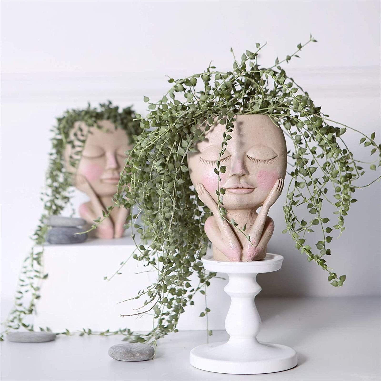 Leken ansikts-blomsterpotte, håndlaget i resin. En unik interiørdekorasjon for planter og hjemmet.