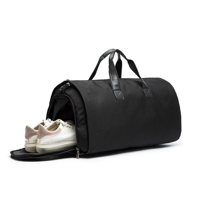 Stilfull dufflebag for reise håndbagasje, perfekt for helgeturer. Unisex og romslig design.
