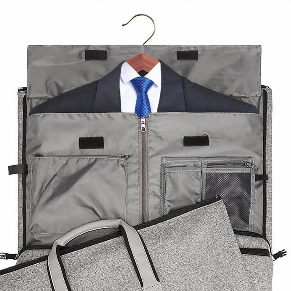 Eksklusiv grå unisex dufflebag, ideell som håndbagasje. Romslig reiseveske for organisert pakking.