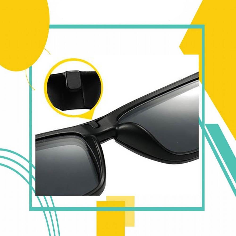 Unisex modell bærer magnetiske clip-on solbriller, viser polarisert UV400 øyebeskyttelse og stil.