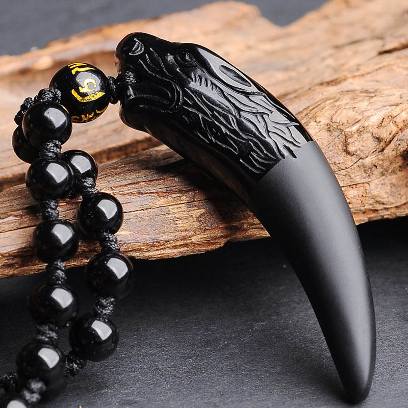 Glansfullt svart obsidian ulvehalskjede. Perfekt unisex amulett for menn og kvinner.