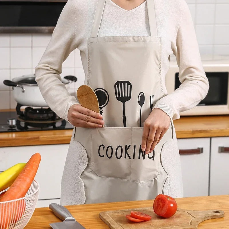 Slitesterkt unisex forkle med oljebestandig finish. Perfekt for matlaging og kjøkkenbruk.