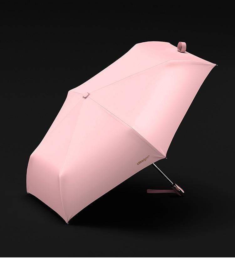 Svart unisex paraply med UV-beskyttelse og kompakt design. Ideell for enkel transport og rask åpning.