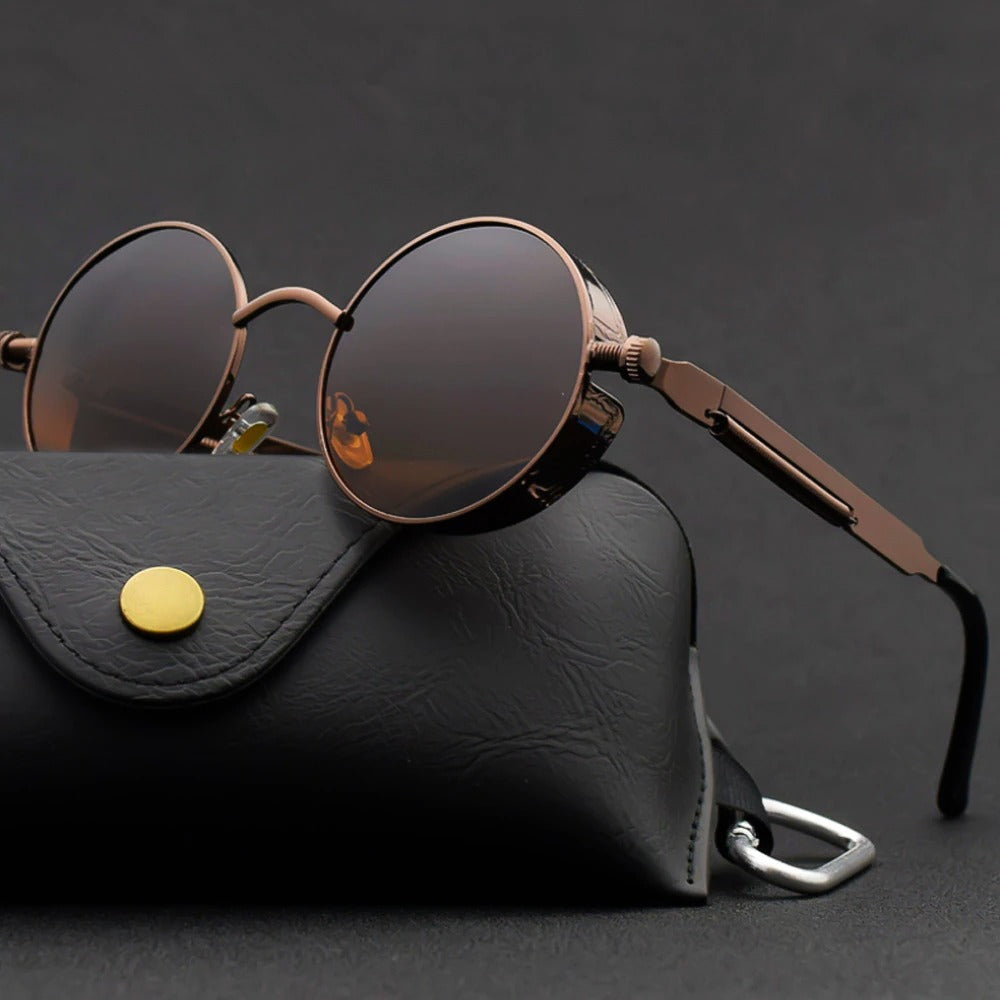 Svarte steampunk solbriller med runde glass og cool gotisk metallramme. Unisex for mote og UV-beskyttelse.