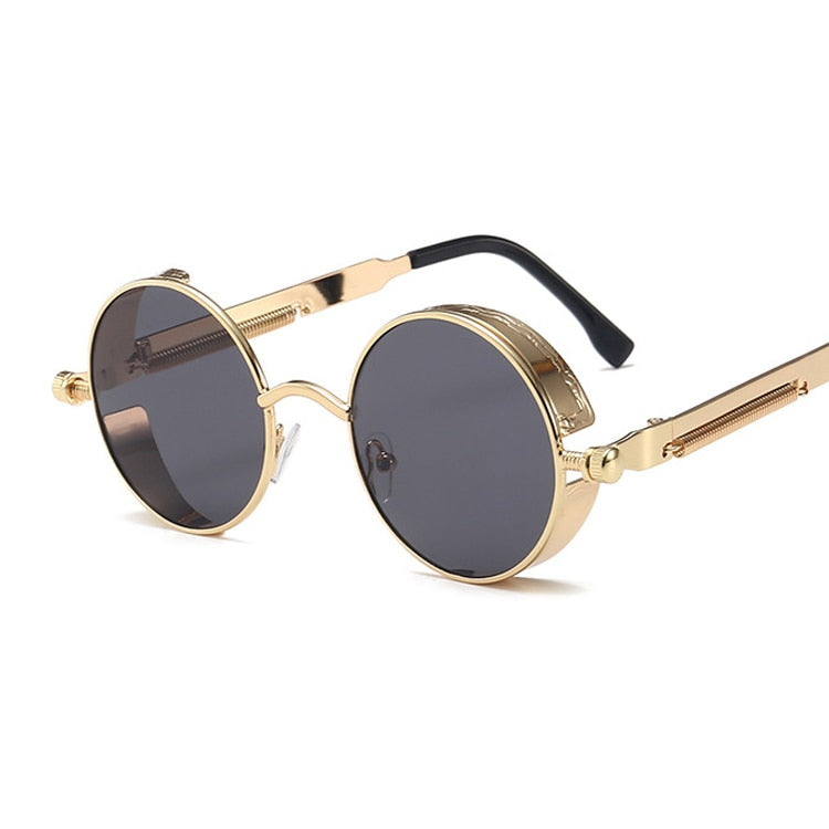 Retro unisex solbriller i steampunk-stil med sirkulære glass og detaljert gotisk metallramme.
