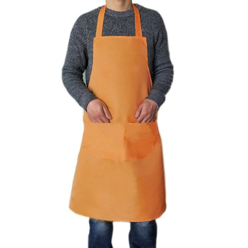 Stilrent vanntett forkle, designet for komfort og maksimal flekkbeskyttelse i kjøkkenet.
