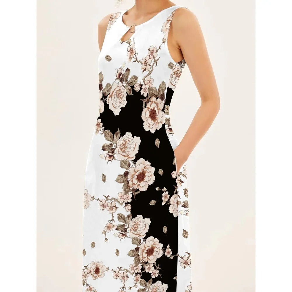 Chic bohemian blomsterkjole, perfekt som feriekjole. Ermeløs og luftig for en trendy sommerlook.
