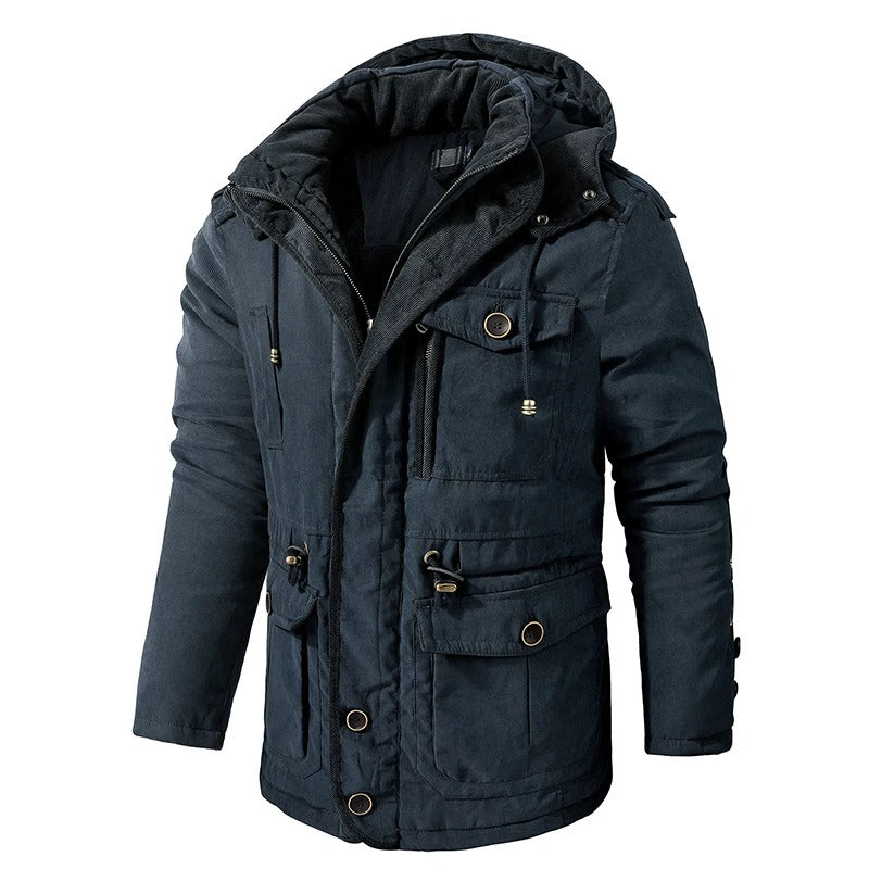 Robust marineblå herre vinterjakke, varm og stilfull parkas for både utendørs og hverdagsbruk. God komfort.