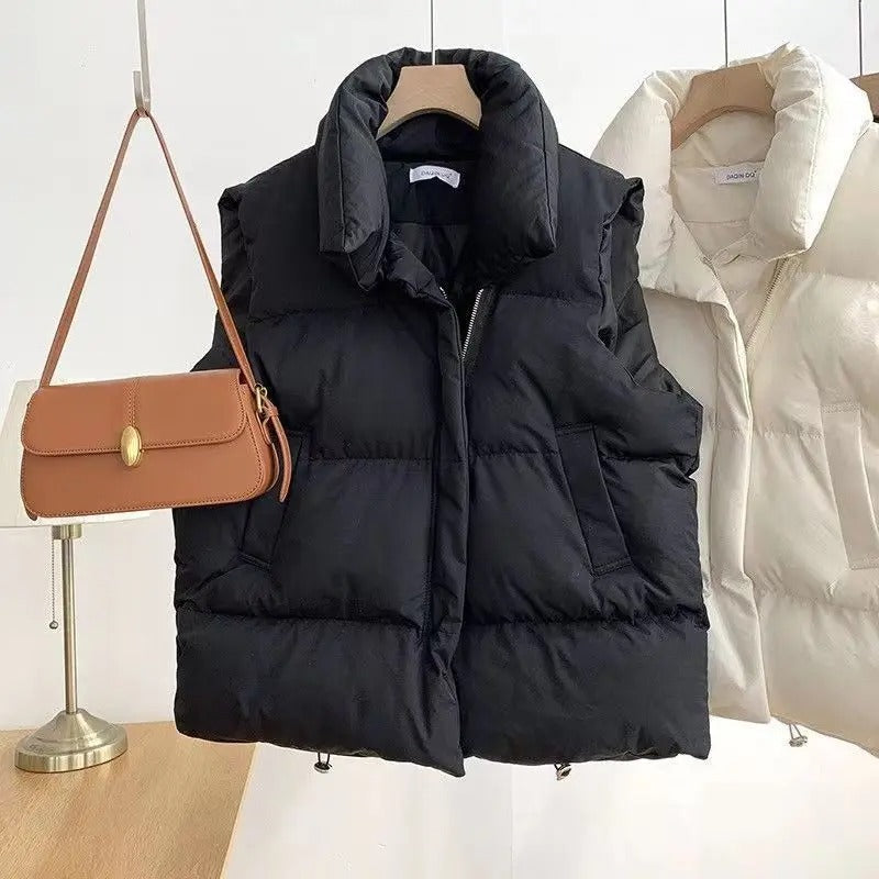Rosa polstret vest for kvinner. Stilfullt yttertøy som gir varme og komfort i kaldt vær.