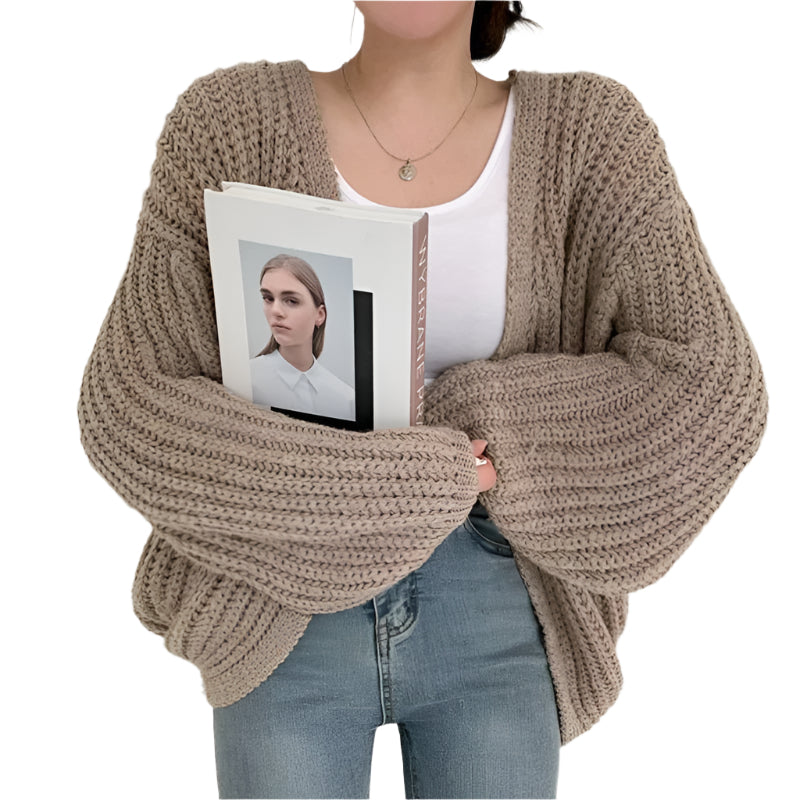 Vintage cardigan for kvinner, løs passform, med stilige lyktermer. Komfortabel hverdagsmote.