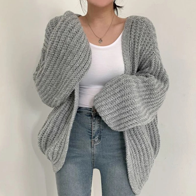 Retro damecardigan med unike lyktermer, myk og behagelig. Ideell for en stilig look.