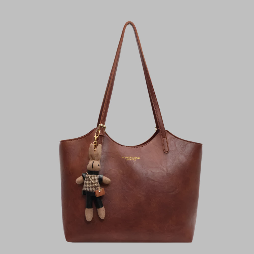 Vintage skinn tote skulderveske for kvinner, romslig og tidløs, perfekt for hverdag eller jobb.