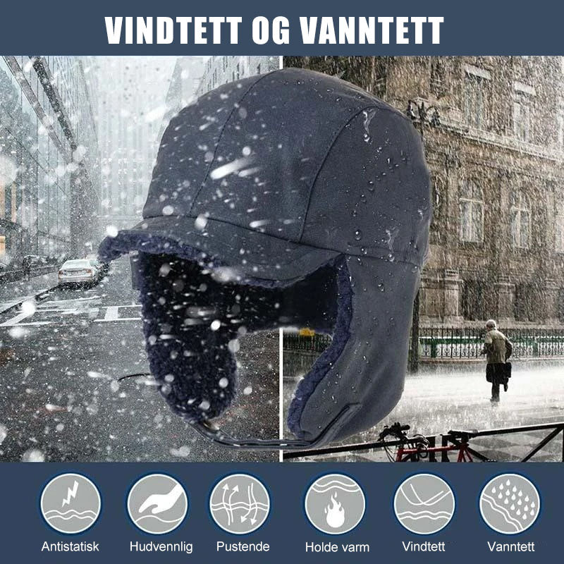 Varm vinterlue med øre- og ansiktsbeskyttelse, perfekt mot kulde og vind under vintersport.